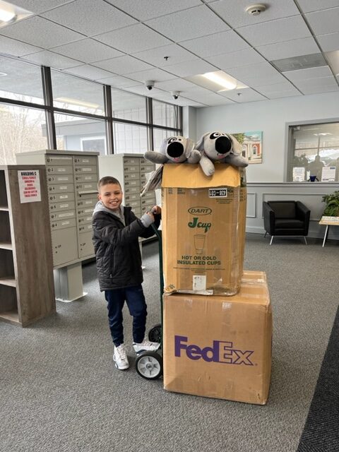 Darius delivering Trouble dogs at DCF Amesbury