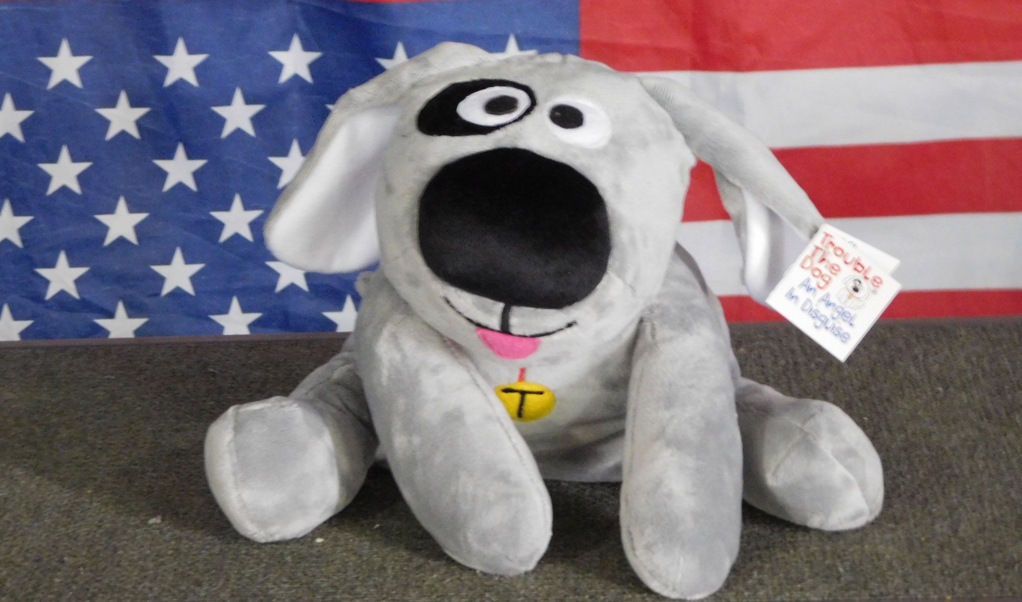 Trouble the Dog with the American flag